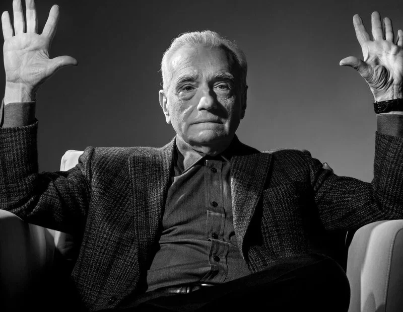 Absolute Cinema meme template: Martin Scorsese raising both hands in a black-and-white photograph