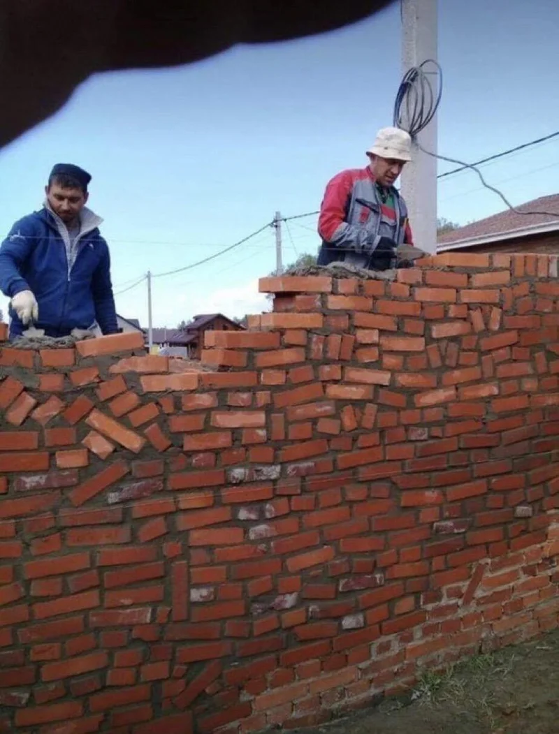 Brick wall vibe coding meme template