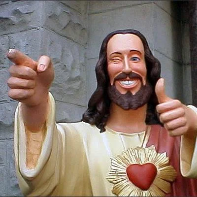 Buddy Christ from Dogma winking and giving a thumbs up