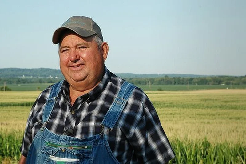 But It's Honest Work meme template: farmer David Brandt standing in his field with humble pride