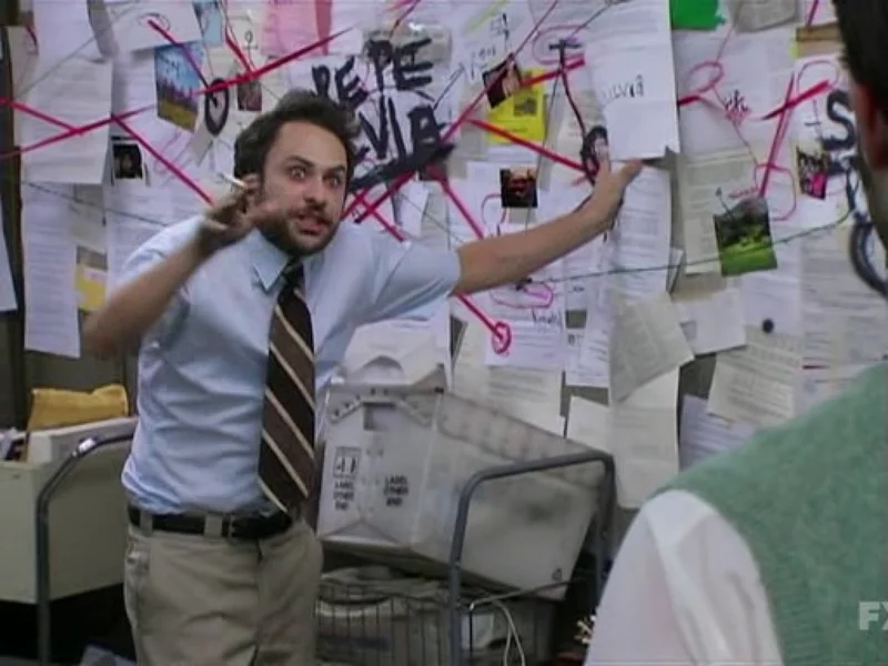 Charlie Conspiracy meme template: Charlie Kelly from It's Always Sunny disheveled in front of a wall of papers and red string