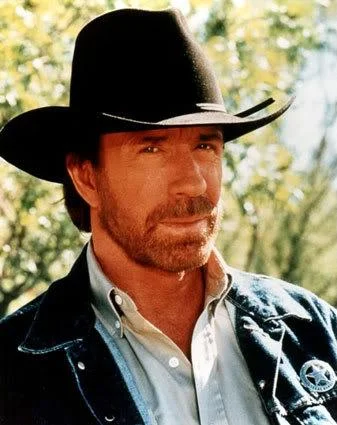 Chuck Norris as Walker Texas Ranger looking stoic in a cowboy hat