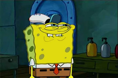 Smug SpongeBob grinning knowingly in the Krusty Krab