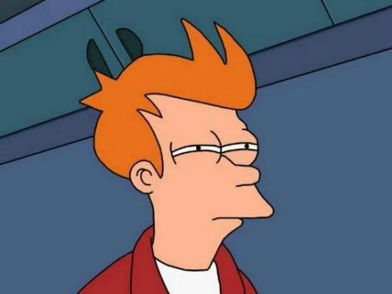 Futurama Fry meme template: Fry from Futurama squinting suspiciously with narrowed eyes