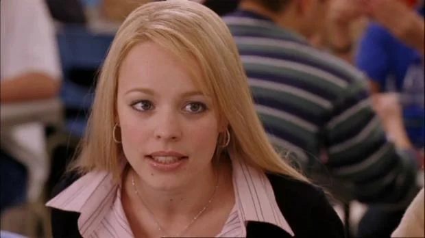 Regina George from Mean Girls looking judgmental meme template