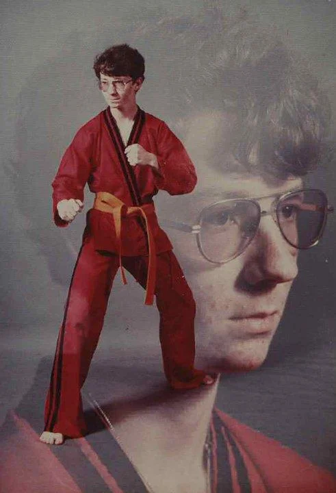 Awkward double-exposure studio portrait of teen in karate uniform