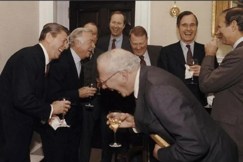 Group of men in suits including Reagan laughing hysterically meme template