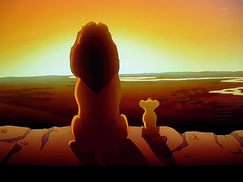 Mufasa and young Simba overlooking the savanna from Pride Rock