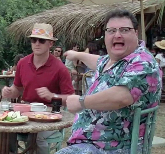 See? Nobody Cares meme template: Dennis Nedry from Jurassic Park gesturing around a cafe