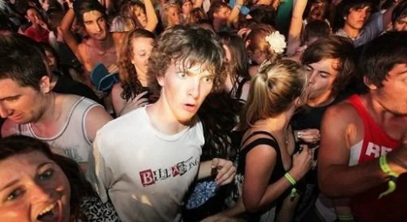 Sudden Clarity Clarence meme template: a wide-eyed young man at a party